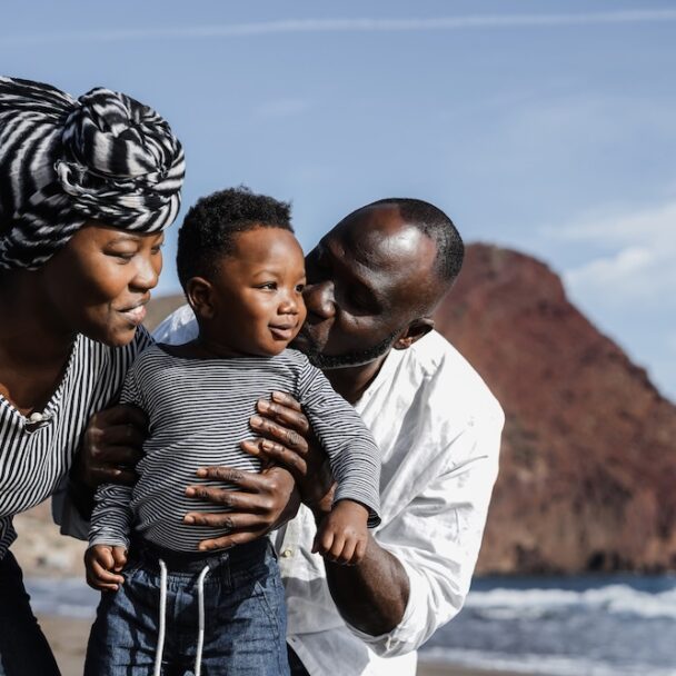 african-family-playing-on-the-beach-in-summer-vaca-2025-10-14-08-22-54-utc